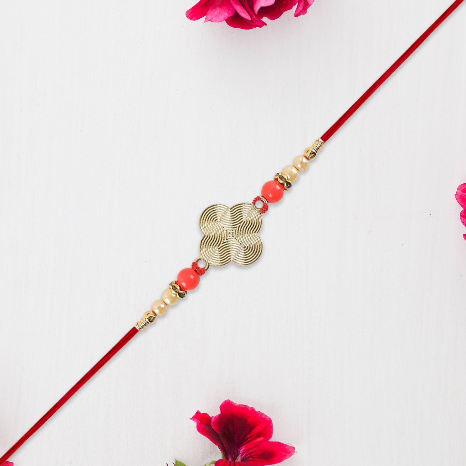 Rakhi With Multicolor Beads  Silver Accents On Red Thread Rakhi With Multicolor Beads  Silver Accents On Red Thread